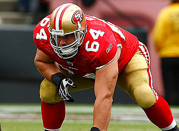 San Francisco 49ers guard David Baas (64) lines up in a three-point stance during an NFL game against the Atlanta Falcons on October 11, 2009.  The Falcons defeated the 49ers 45-10. (AP Photo/Kevin Te